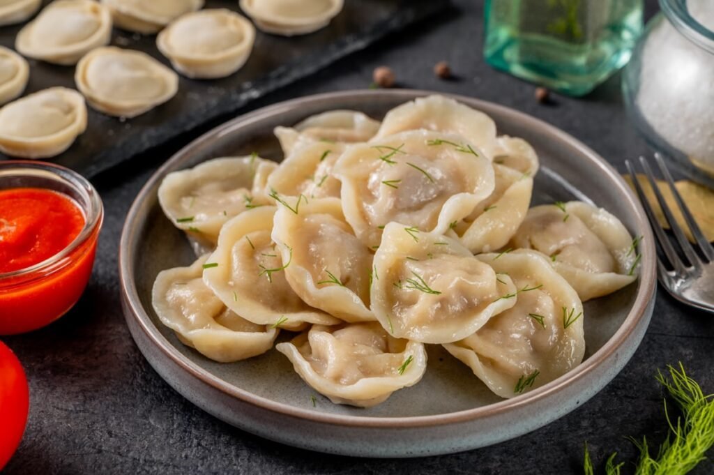 Pelmeni and tomato sacue